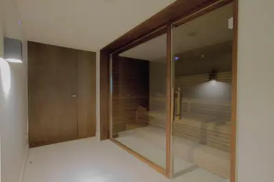 a room with a sliding glass door with a bedroom at Alma Barcelona GL in Barcelona