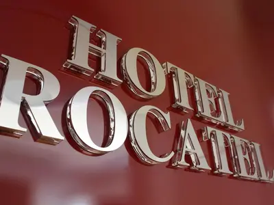 a close up of a sign for a car dealership at Rocatel in Canet de Mar