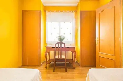 a dining room with a table and a window at Sitges Malvasia · Paz en el Corazón de Sitges in Sitges