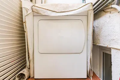 a bathroom with a white toilet and a green wall at Fridays Flats Dreamy Duplex - Stylish Beach Loft in Barcelona