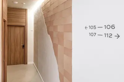 a hallway with a wall with a measureerror at Casa Lirio in Barcelona