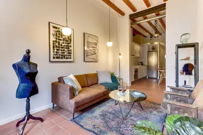 a living room with a couch and a table at Sweett - Ausias Marc in Barcelona