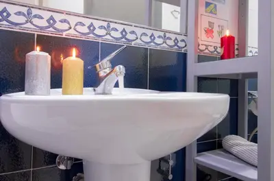 a bathroom with a sink and a mirror at Armapana in Barcelona