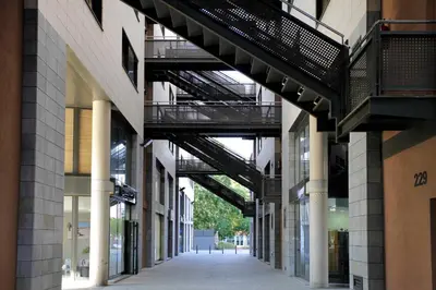 an empty alley in a building with a walkway between buildings at 1217 - POOL AND BEACH NICE APARTMENT II in Barcelona