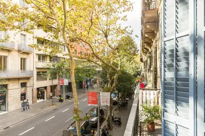 a street view from the window of a building at Montaber Apartment - Trafalgar in Barcelona