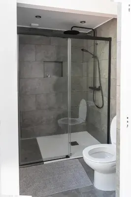 a bathroom with a shower and a toilet at B-Garden BCN in Barcelona