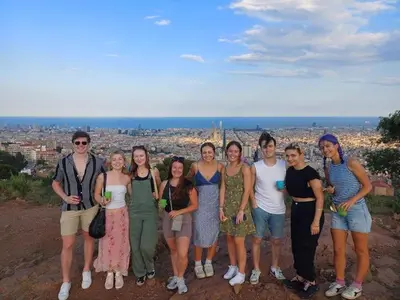a group of people standing on top of a hill at Itaca Hostel in Barcelona