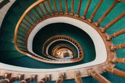 a spiral staircase in a building at Primero Primera in Barcelona