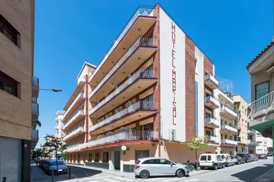 a building with a sign on the side of it at Hotel Mar i Sol in Calella