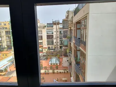 a view of a city from a window at Pension Casa De Barca in Barcelona