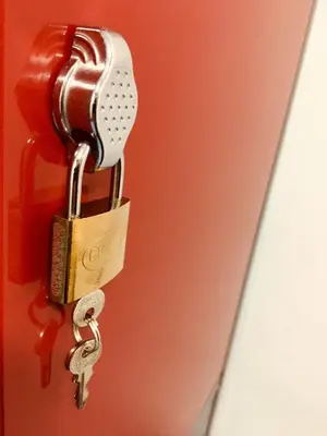 a set of keys hanging from a door latch at Hostel New York in Barcelona