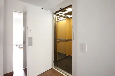 a glass door leading to a closet in a room at AB Montjuic in Barcelona