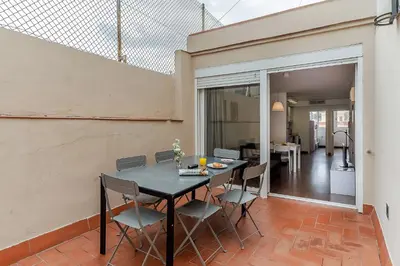 a dining room with a table and chairs at AB Montjuic in Barcelona