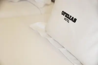 a close up of a book with a sticker on it at Ofelias Hotel 4Sup in Barcelona