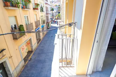 a view of a street from a balcony of a building at Lucy Apartment by Hello Homes Sitges in Sitges