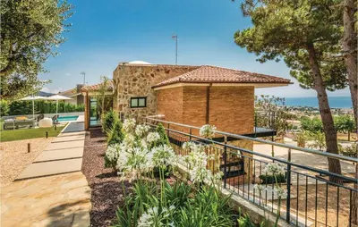 a house with a view of a garden at Stunning Home In Alella With Wifi in Alella