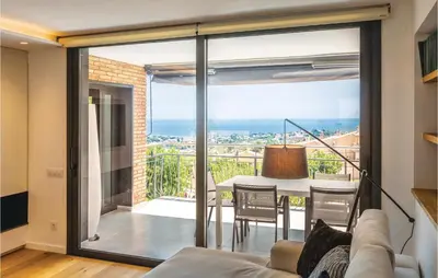 a living room with a view of the ocean at Stunning Home In Alella With Wifi in Alella