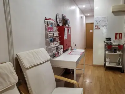 a room with a clinic with a table and a chair at Barcelona Rooms 294 in Barcelona