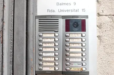a cell phone is attached to a wall at Sleep Green - Certified Eco Youth Hostel in Barcelona
