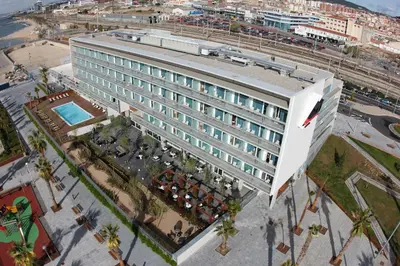 an overhead view of a building with a pool at Atenea Port Barcelona Mataró in Mataró