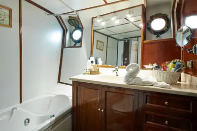 a bathroom with a sink with a stuffed animal on it at Southern Cross in Barcelona