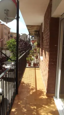 a balcony with a iron gate on a building at Apartamentos Atlas Terrassa III in Terrassa