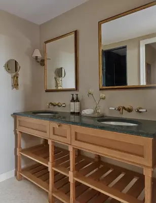a bathroom with two sinks and a mirror at Miiro Borneta in Barcelona