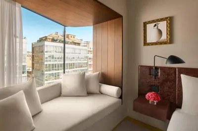 a window seat in a hotel room with a view at The Barcelona EDITION in Barcelona