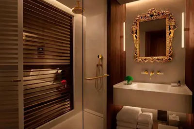 a bathroom with a sink and a mirror at The Barcelona EDITION in Barcelona