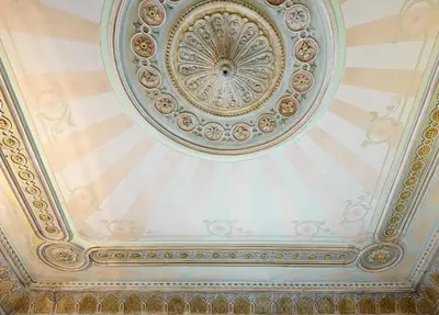 an ornate ceiling with a painted ceiling at BruStar Gotic-Centric in Barcelona