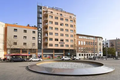 a balcony with a view of a building at Hostal Sans in Barcelona