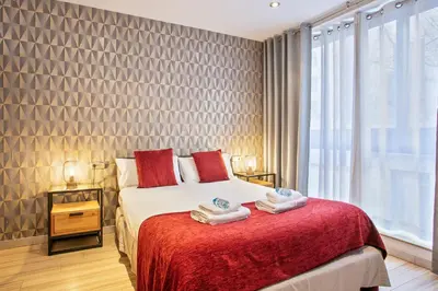 a bedroom with a bed with towels on it at Alcam Alio 2 in Barcelona