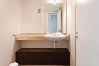 a bathroom with a sink and a mirror at 4131 - AB Diagonal - Sant Adrià de Besòs in Sant Adria de Besos