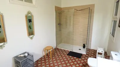 a bathroom with a shower with a glass door at MARISOL SEAVIEW & BEACH - apartment in Masnou