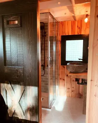 a bathroom with a shower and a sink at HolaCamp Sitges Garrofer in Sitges