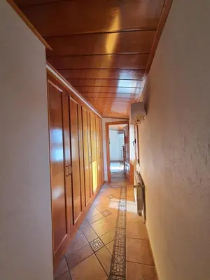 a hallway of a house with a wooden ceiling at Raco de Lis in La Torre de Claramunt