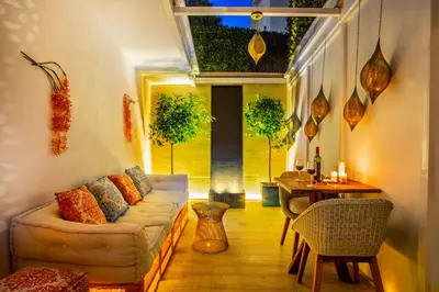 a living room with a couch and a table at Antonio's House in Sitges