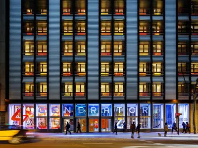 a facade of a building with people walking in front of it at Generator Barcelona in Barcelona