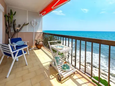 a balcony with a view of the ocean at Apartment Acuario by Interhome in Sant Andreu de Llavaneres