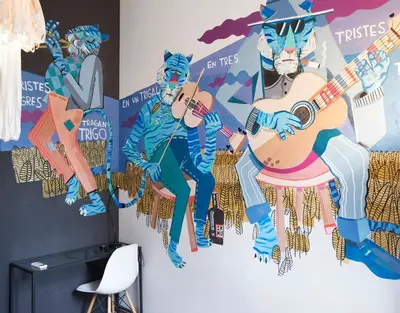a mural of a band on a wall at ZOOROOMS Boutique Guesthouse in Barcelona