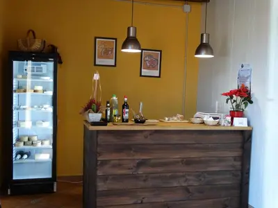 a counter in a kitchen with a refrigerator at La Frasera Alojamiento Rural in Vacarisas
