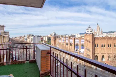 a balcony with a view of a city at Apartament Sagrada Familia in Barcelona