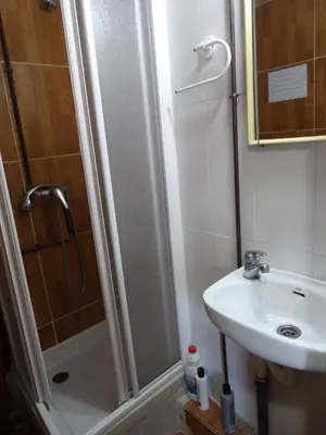 a bathroom with a shower and a sink at Pensión Teruel in Barcelona