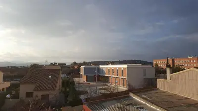a view of a city with buildings at Pensión Avenida in Vilafranca del Penedès