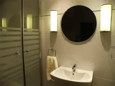 a bathroom with a sink and a mirror at Hotel Center Gran Via in Barcelona