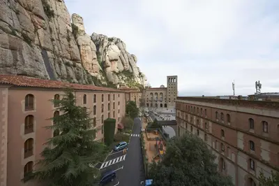 a view of a city with a mountain in the background at Apartamentos Montserrat Abat Marcet in Montserrat
