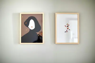 two framed illustrations of a woman on a wall at Hotel Vasanta in Barcelona