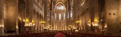a large cathedral with chairs and chandeliers in it at Nice apartment in the middle of Born in Barcelona