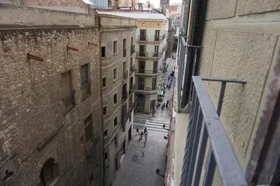 a view of a city street from a building at Pensión Casa Blanca in Barcelona