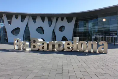 a building with a large sign in front of it at ApartsNouBcn Fira Barcelona in Hospitalet de Llobregat